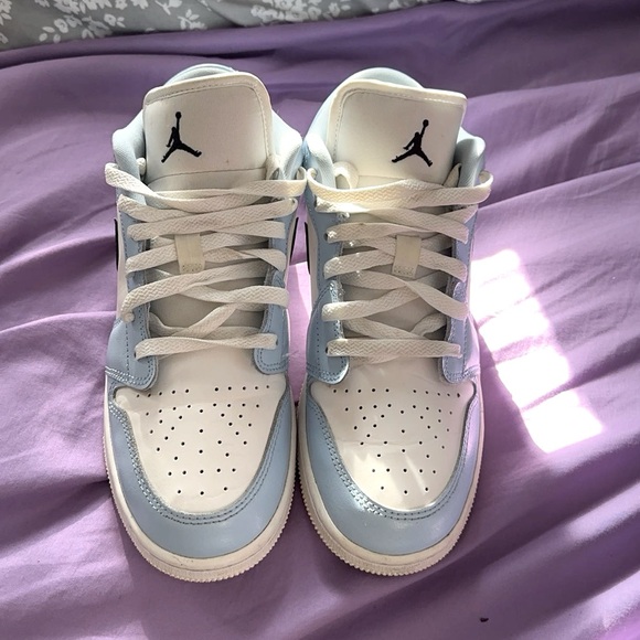low jordans, size 6y, baby blue with black symbols